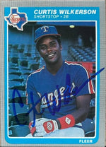 Curtis Wilkerson Signed 1985 Fleer Baseball Card - Texas Rangers #573