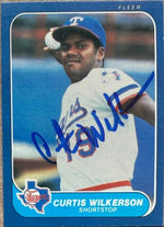 Curtis Wilkerson Signed 1986 Fleer Baseball Card - Texas Rangers #577