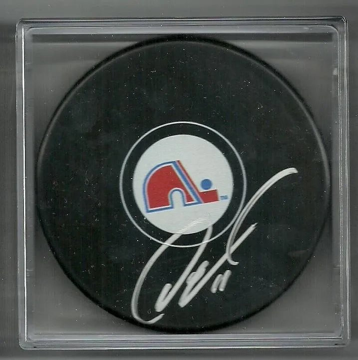 Owen Nolan Signed Hockey Puck - Quebec Nordiques